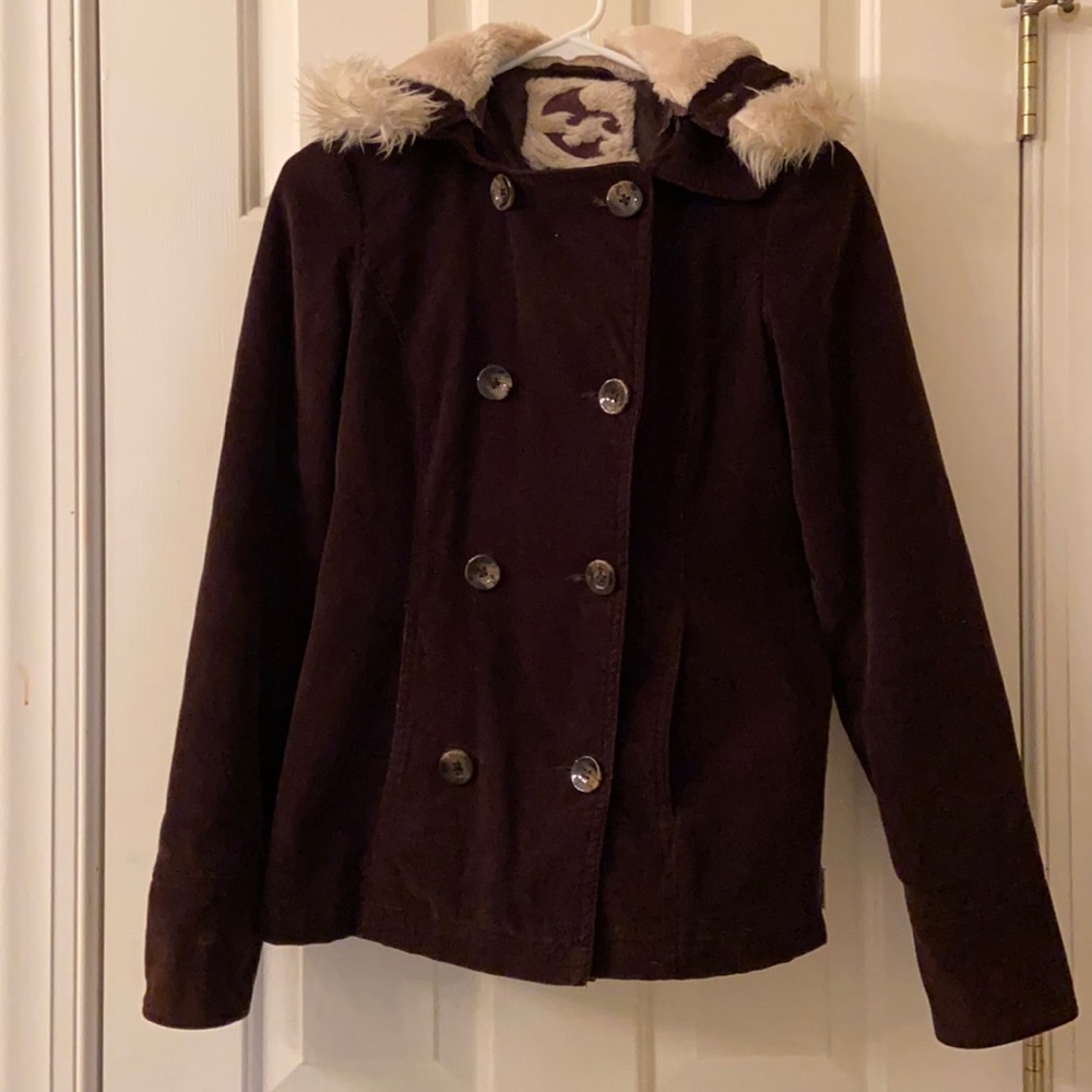 Winter jacket. Missing one button on wrist.